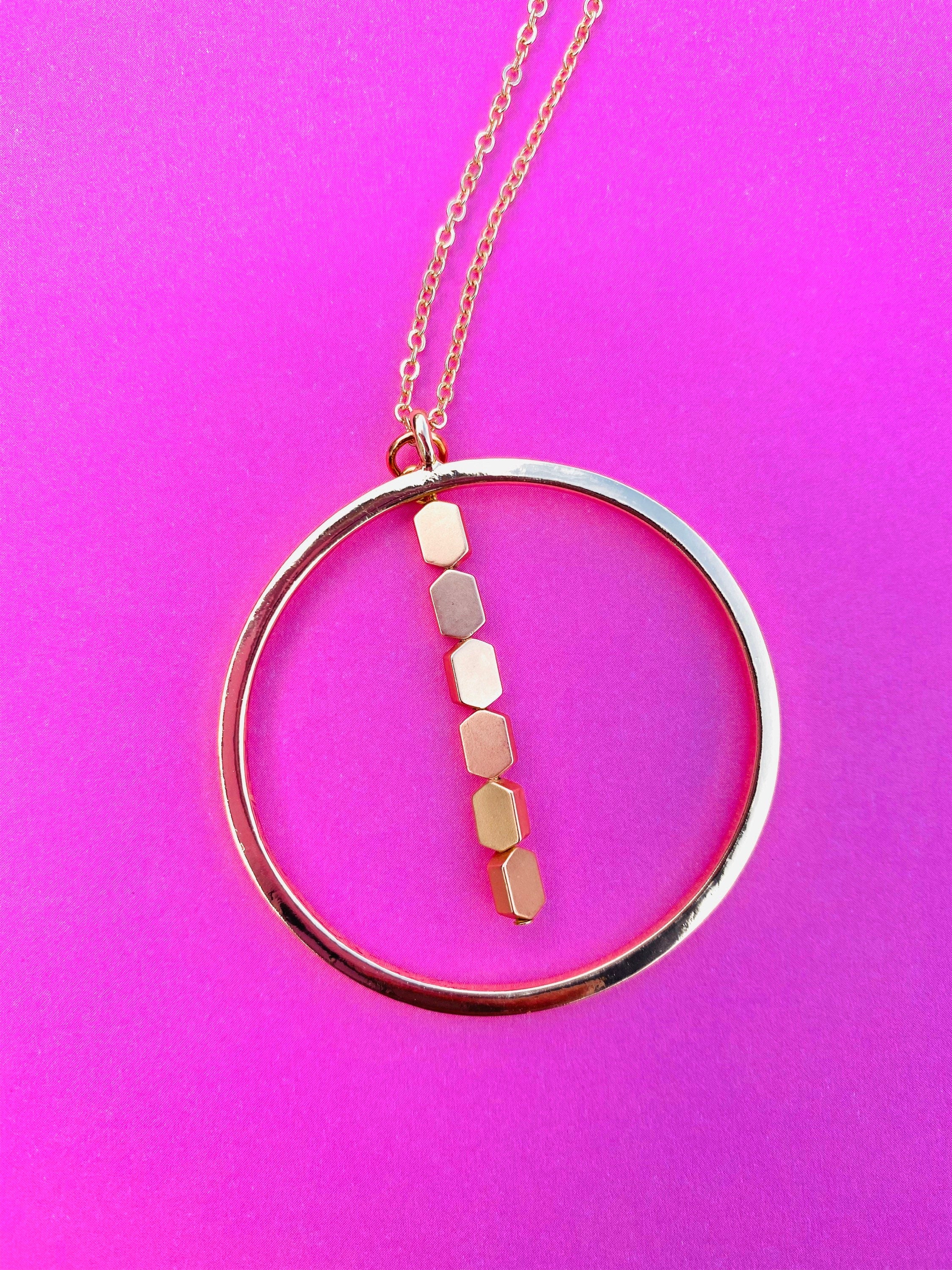 Gold Circular Pendant Necklace with Matte Hematite Beads, 30 Inch