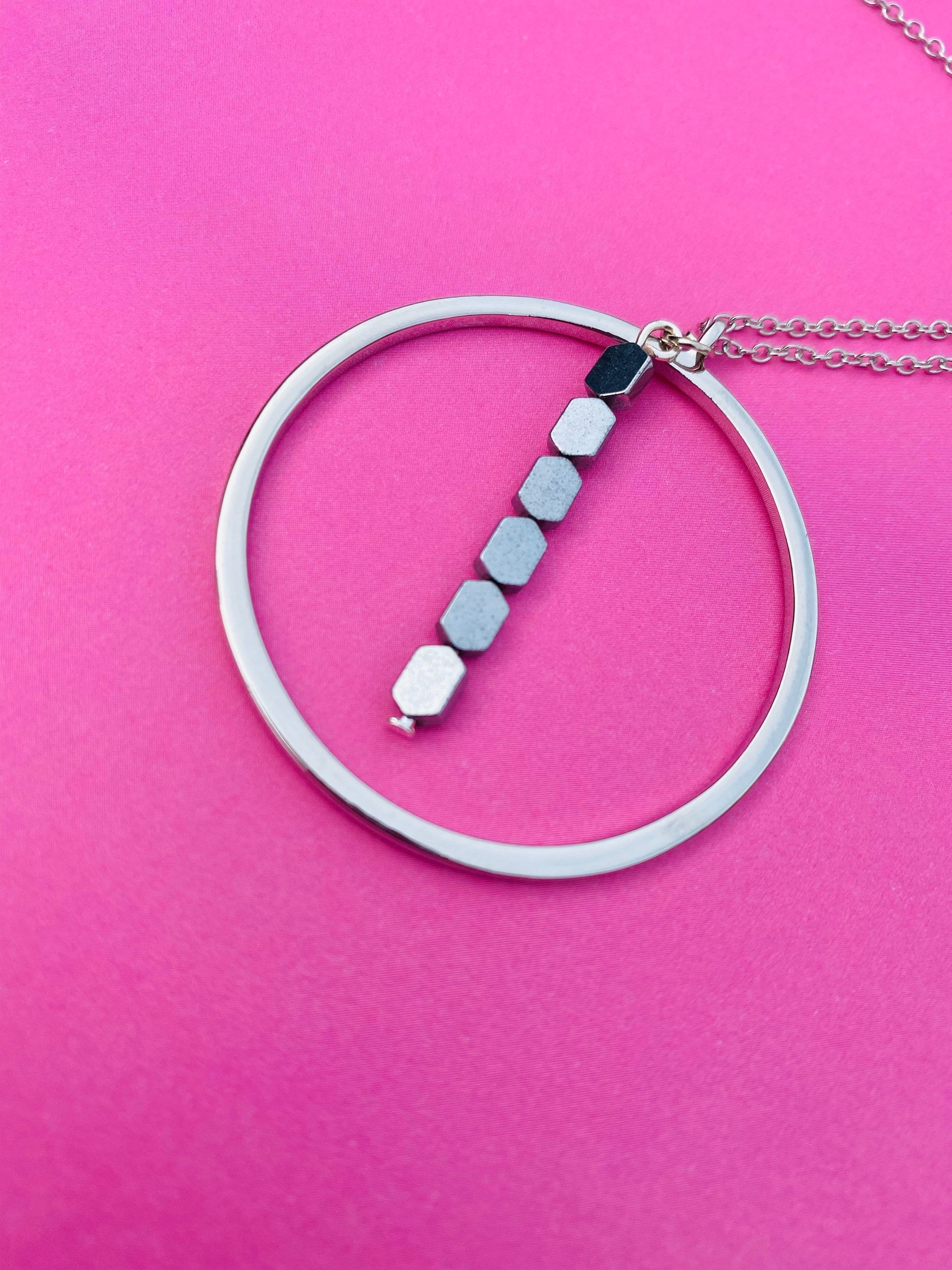 Silver Plated Circular Pendant Necklace with Hematite Beads, 30 Inch