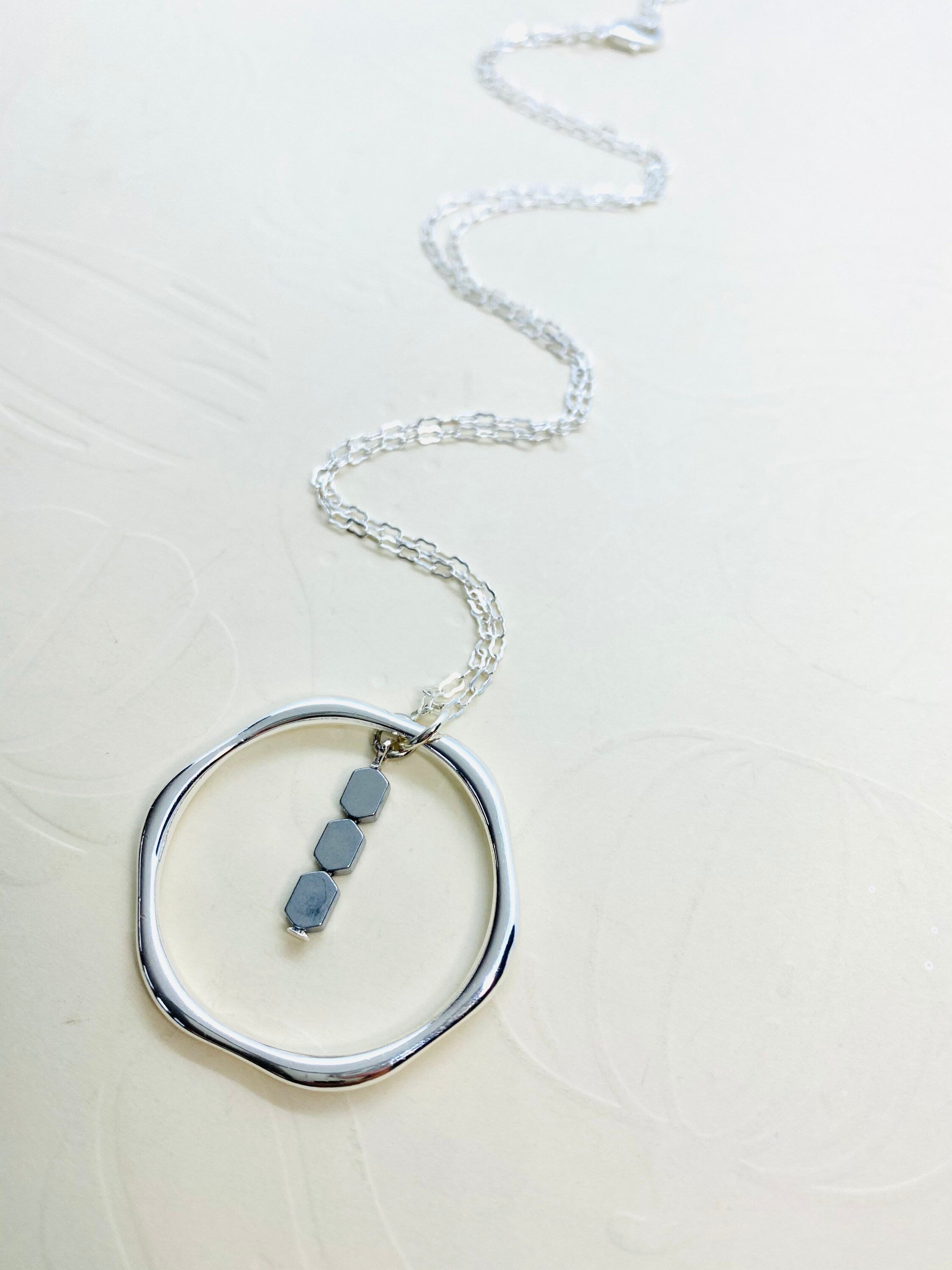 Silver Hexagon Pendant Necklace with Hematite Beads, 30 Inch Chain