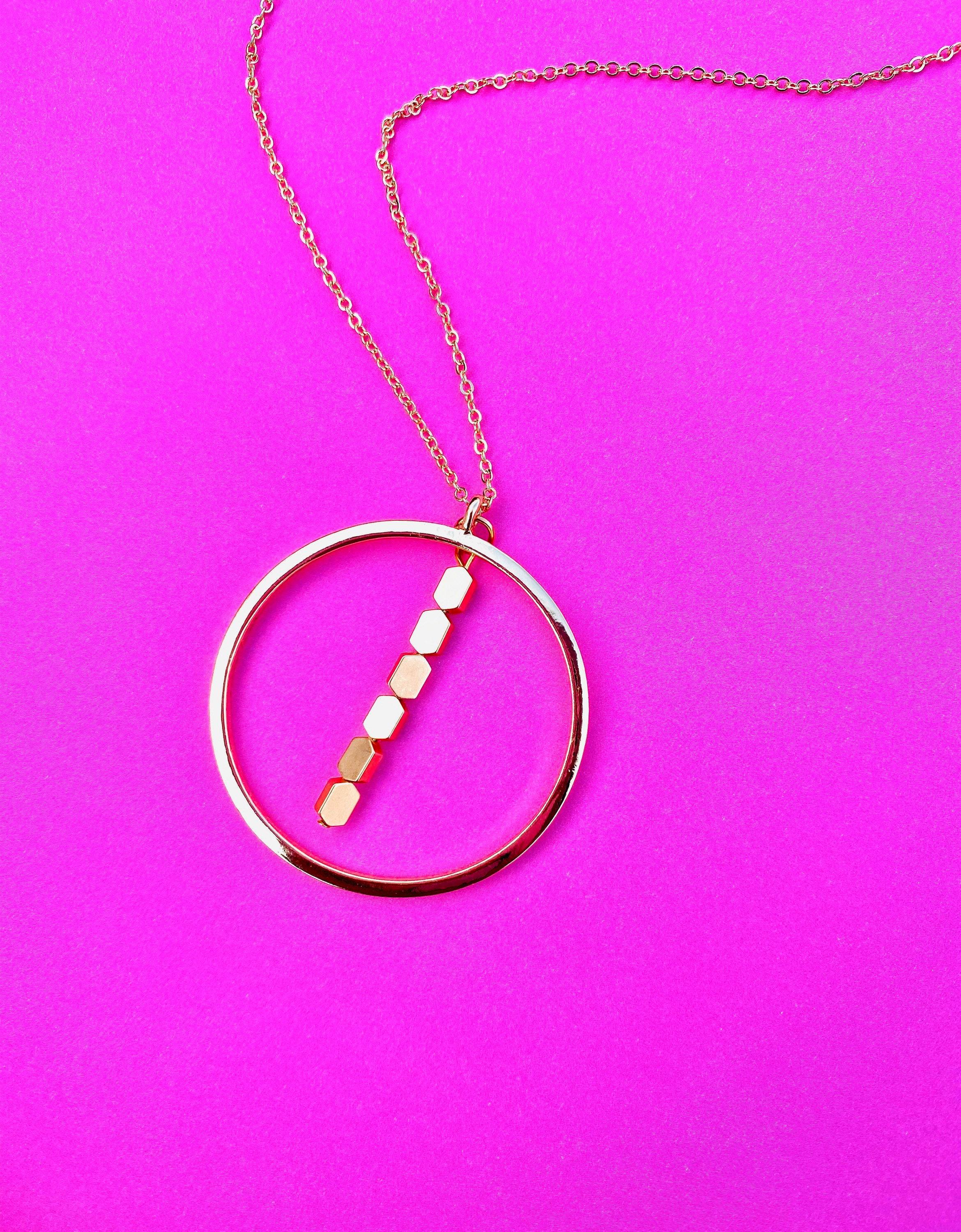 Gold Circular Pendant Necklace with Matte Hematite Beads, 30 Inch