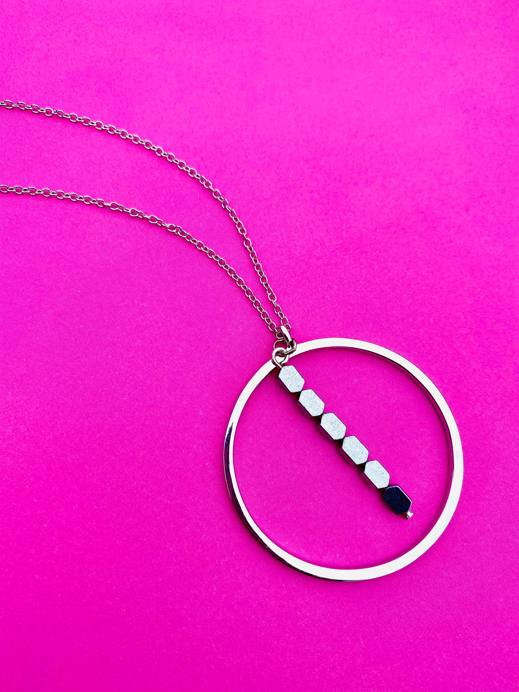Silver Plated Circular Pendant Necklace with Hematite Beads, 30 Inch