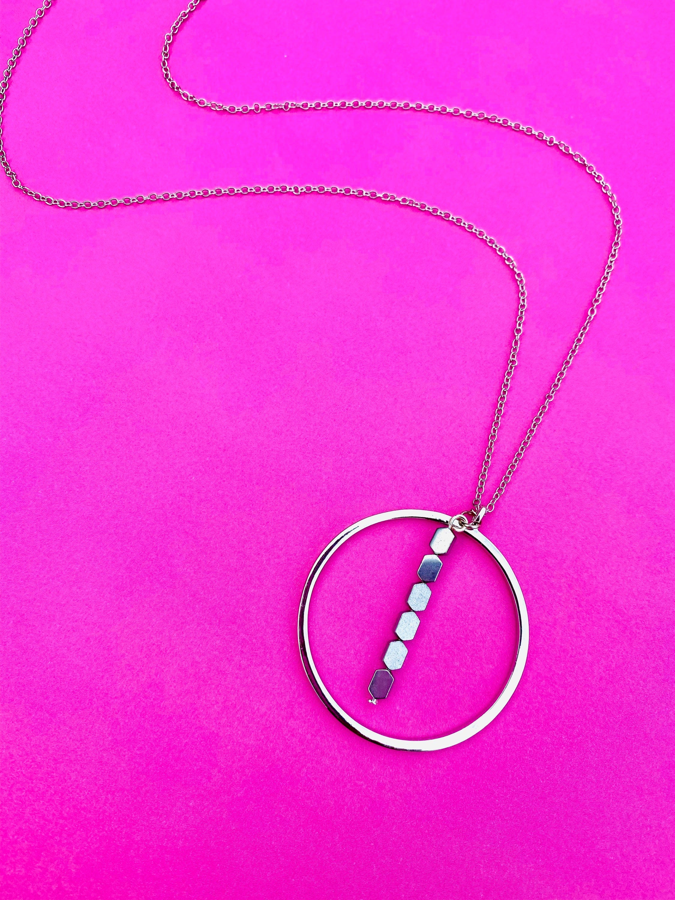 Silver Plated Circular Pendant Necklace with Hematite Beads, 30 Inch