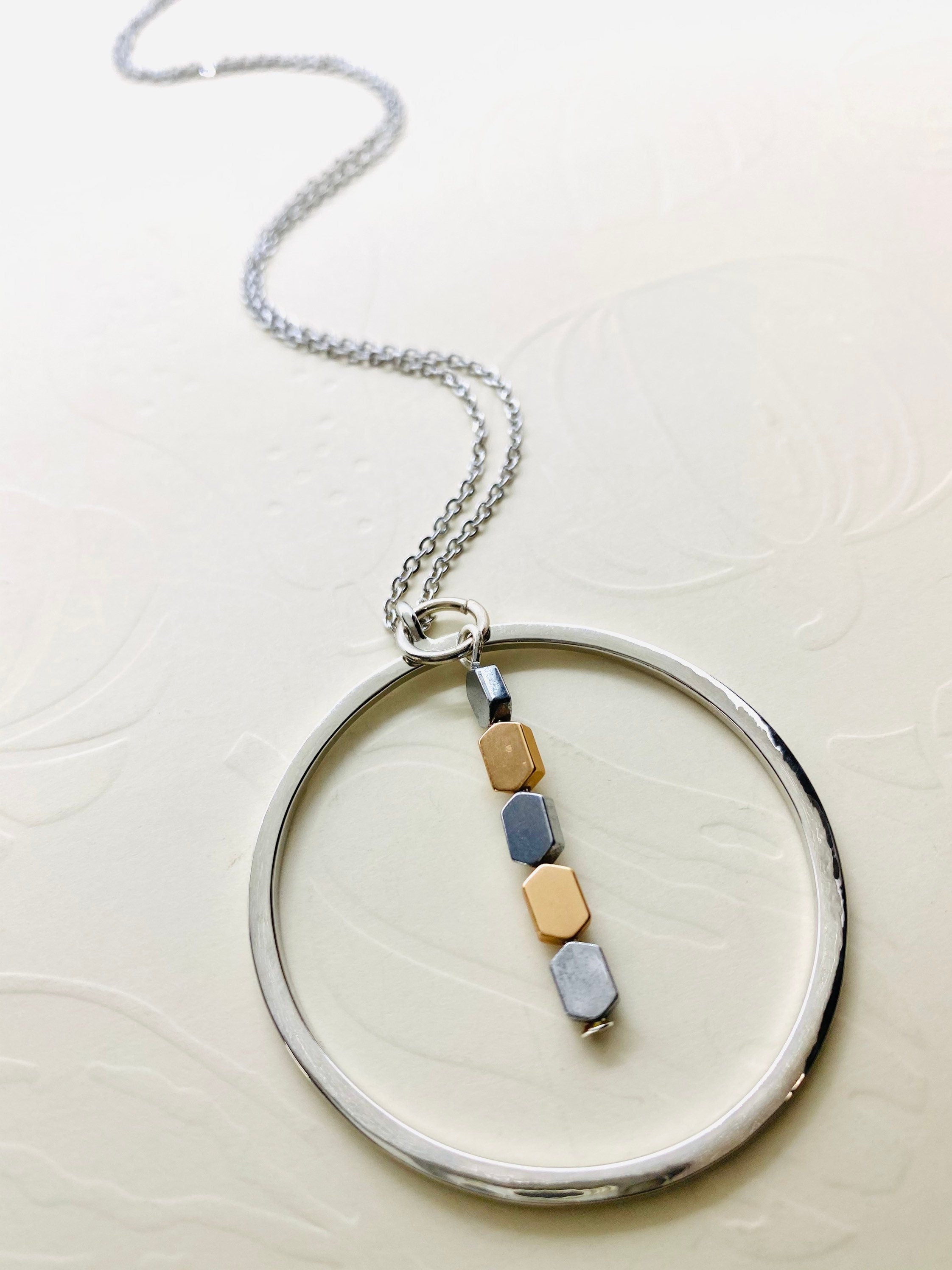 Silver Plated Circular Pendant Necklace with Hematite Beads
