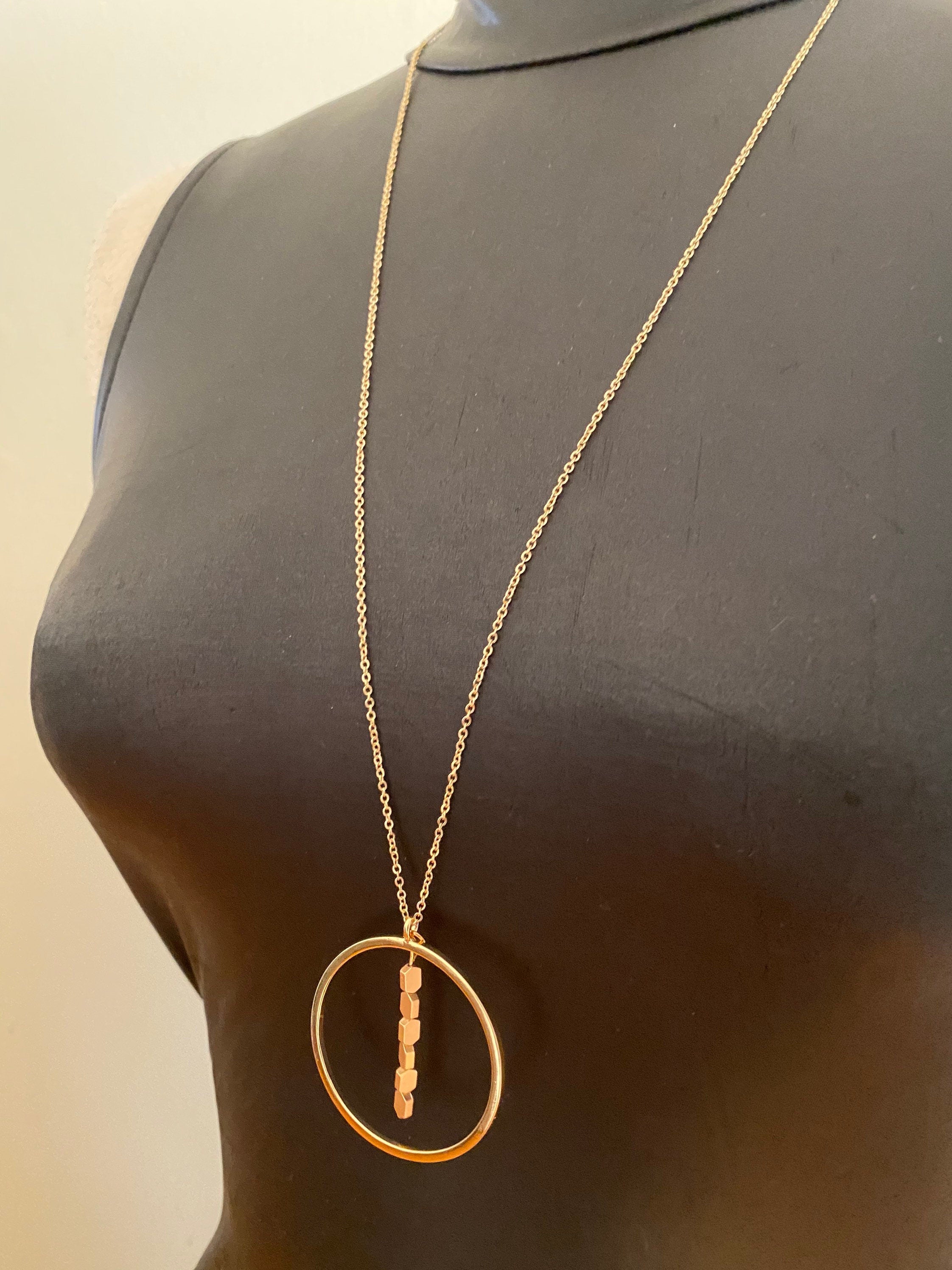 Gold Circular Pendant Necklace with Matte Hematite Beads, 30 Inch