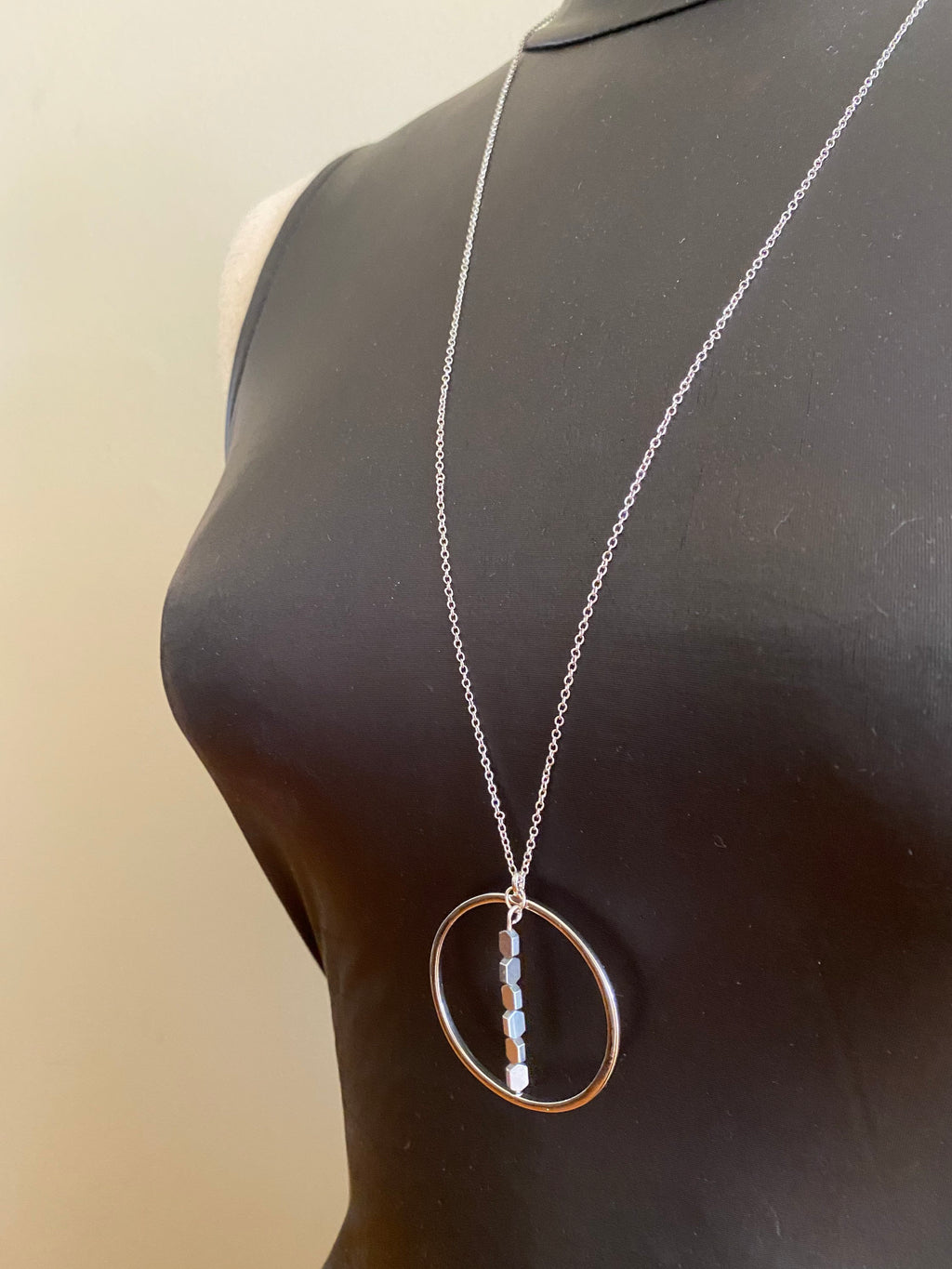 Silver Plated Circular Pendant Necklace with Hematite Beads, 30 Inch