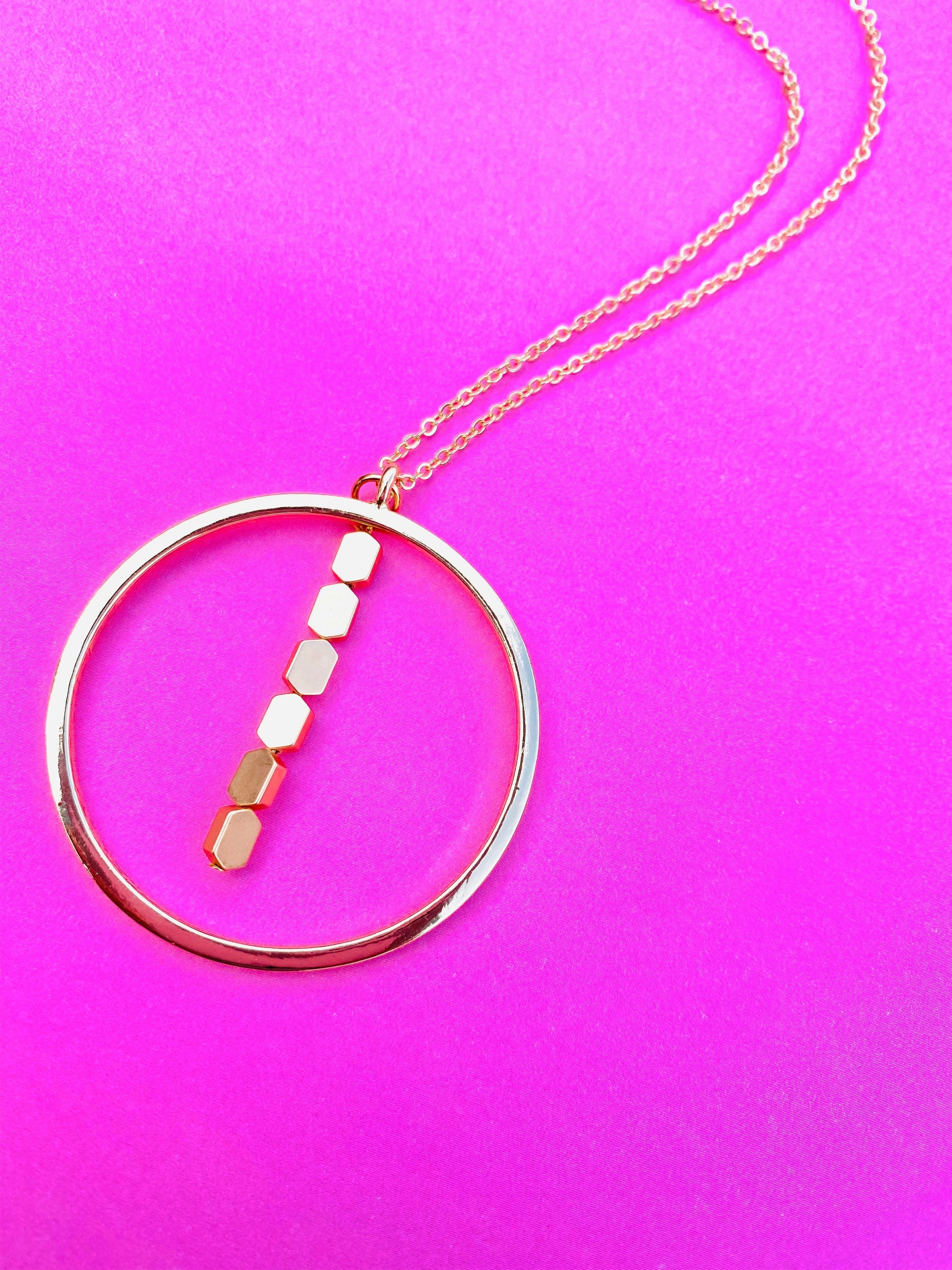 Gold Circular Pendant Necklace with Matte Hematite Beads, 30 Inch