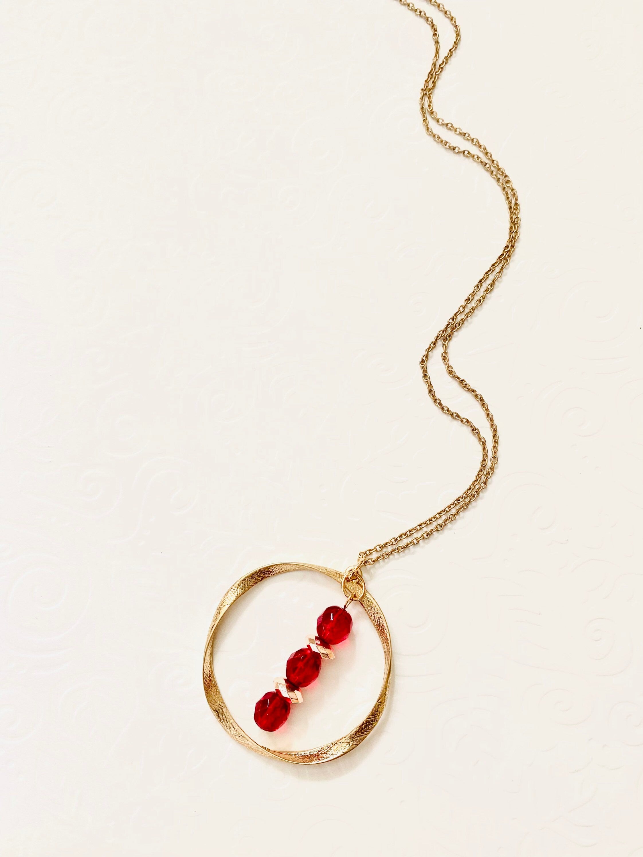 Red Crystal Gold Pendant Necklace, Circular Charm, 30 Inch Chain