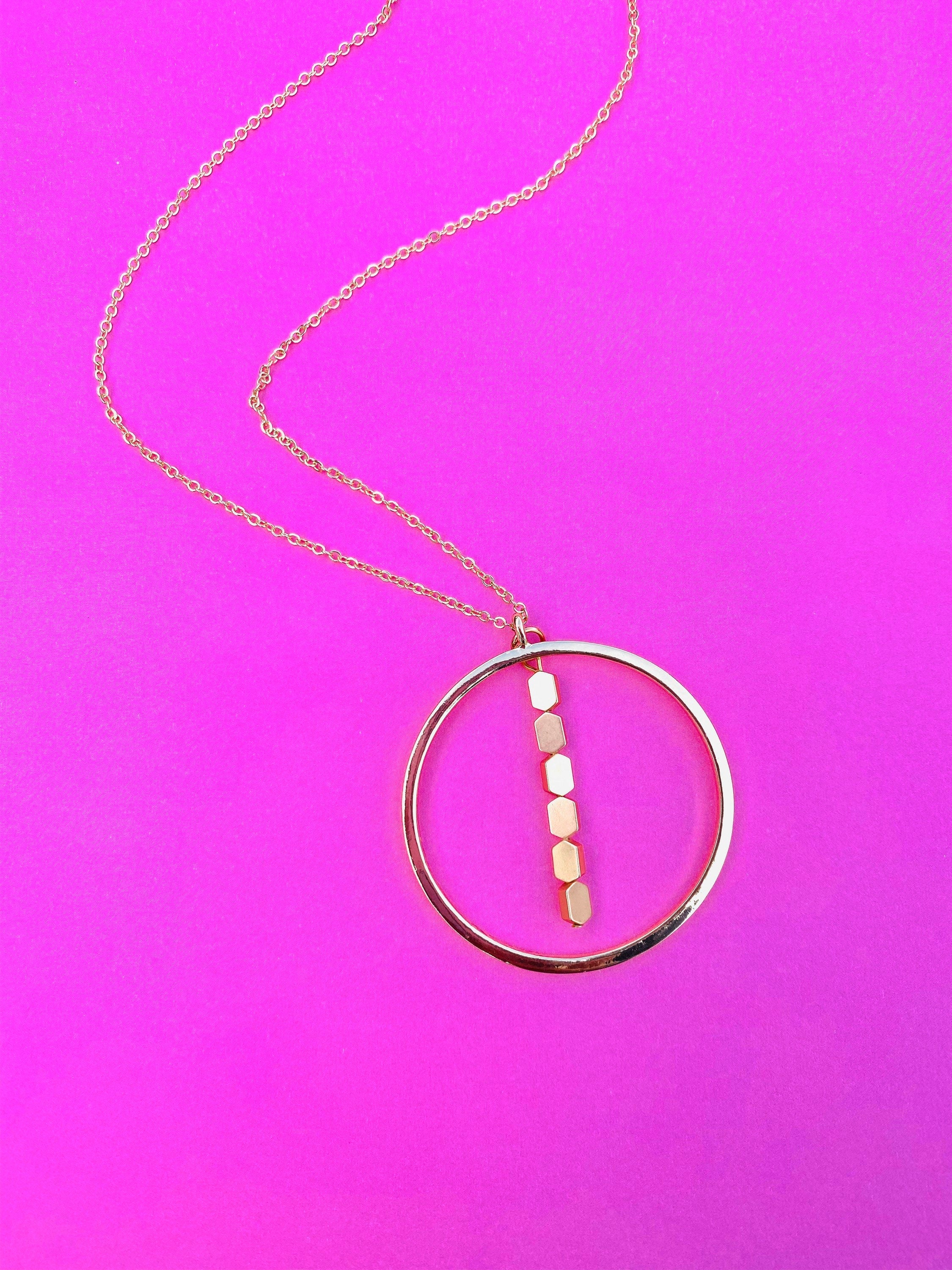 Gold Circular Pendant Necklace with Matte Hematite Beads, 30 Inch