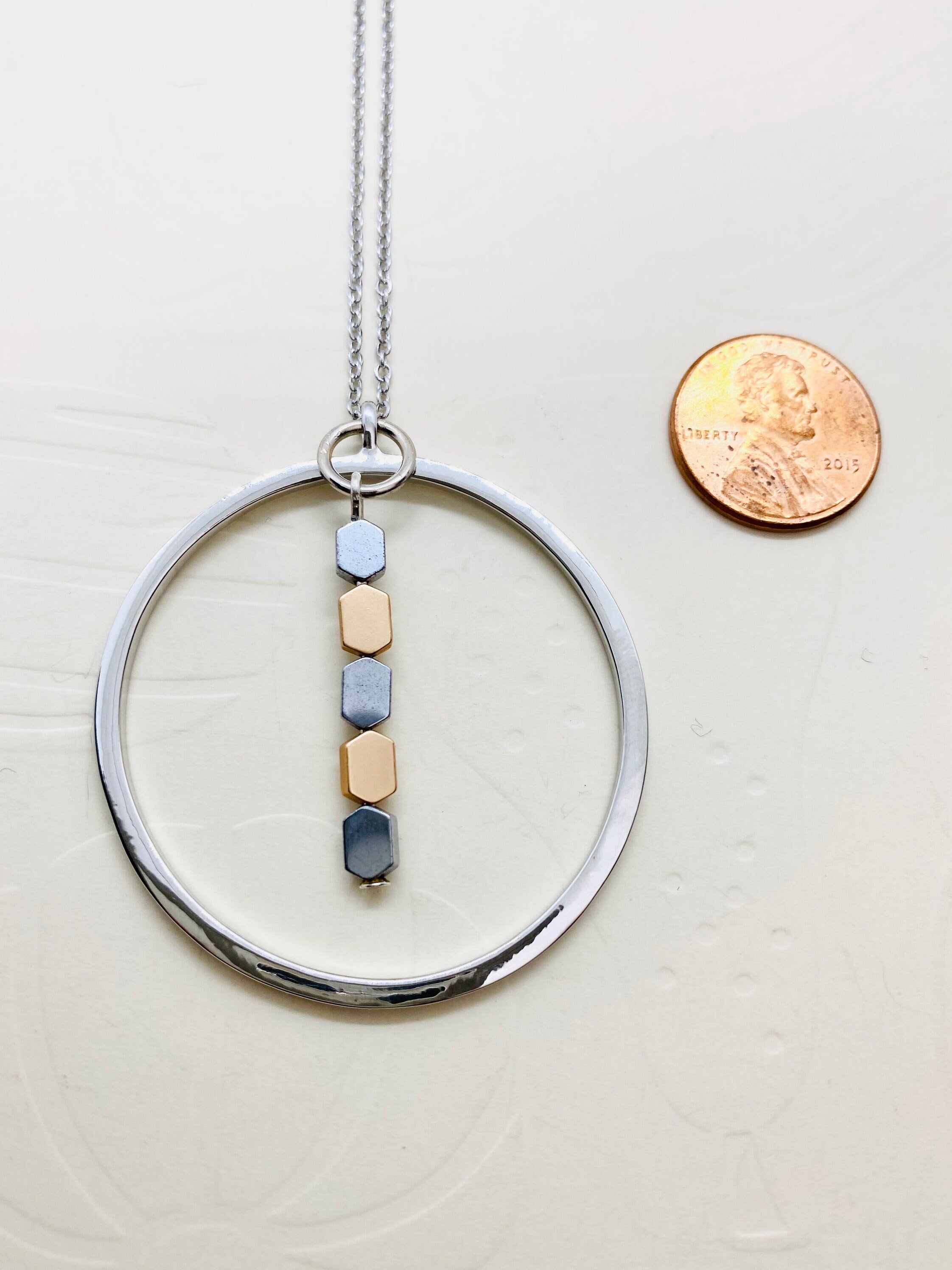 Silver Plated Circular Pendant Necklace with Hematite Beads
