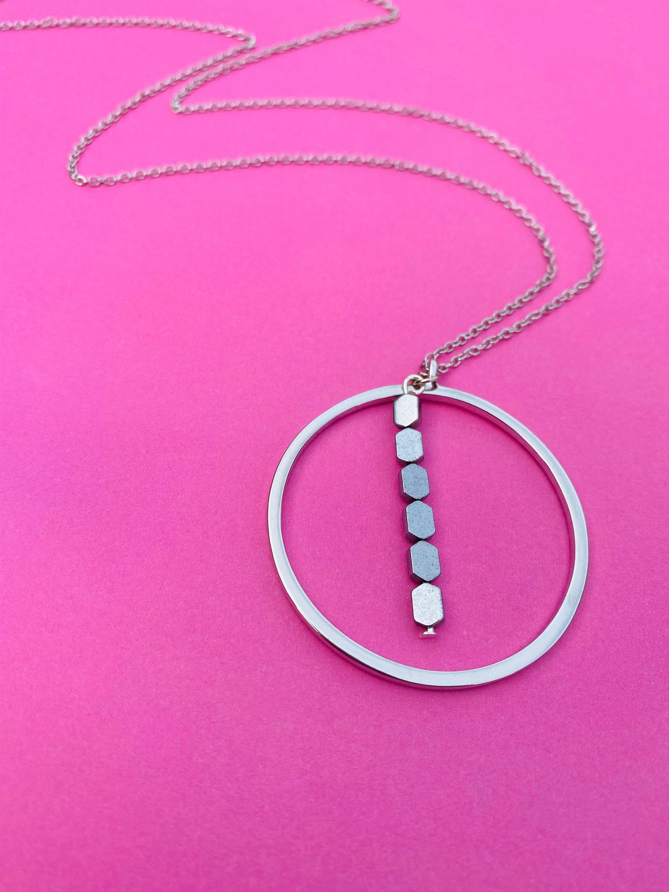 Silver Plated Circular Pendant Necklace with Hematite Beads, 30 Inch