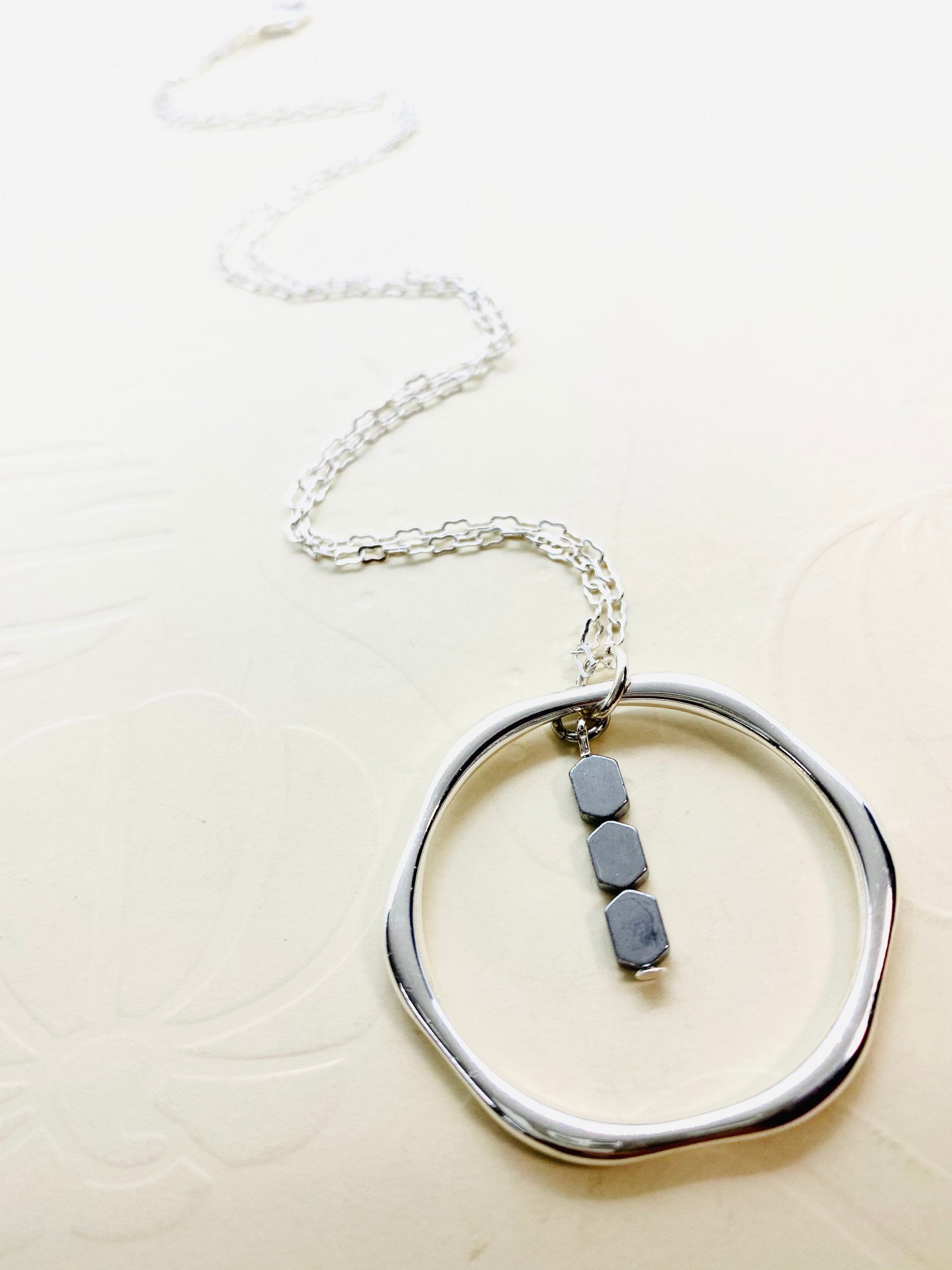 Silver Hexagon Pendant Necklace with Hematite Beads, 30 Inch Chain